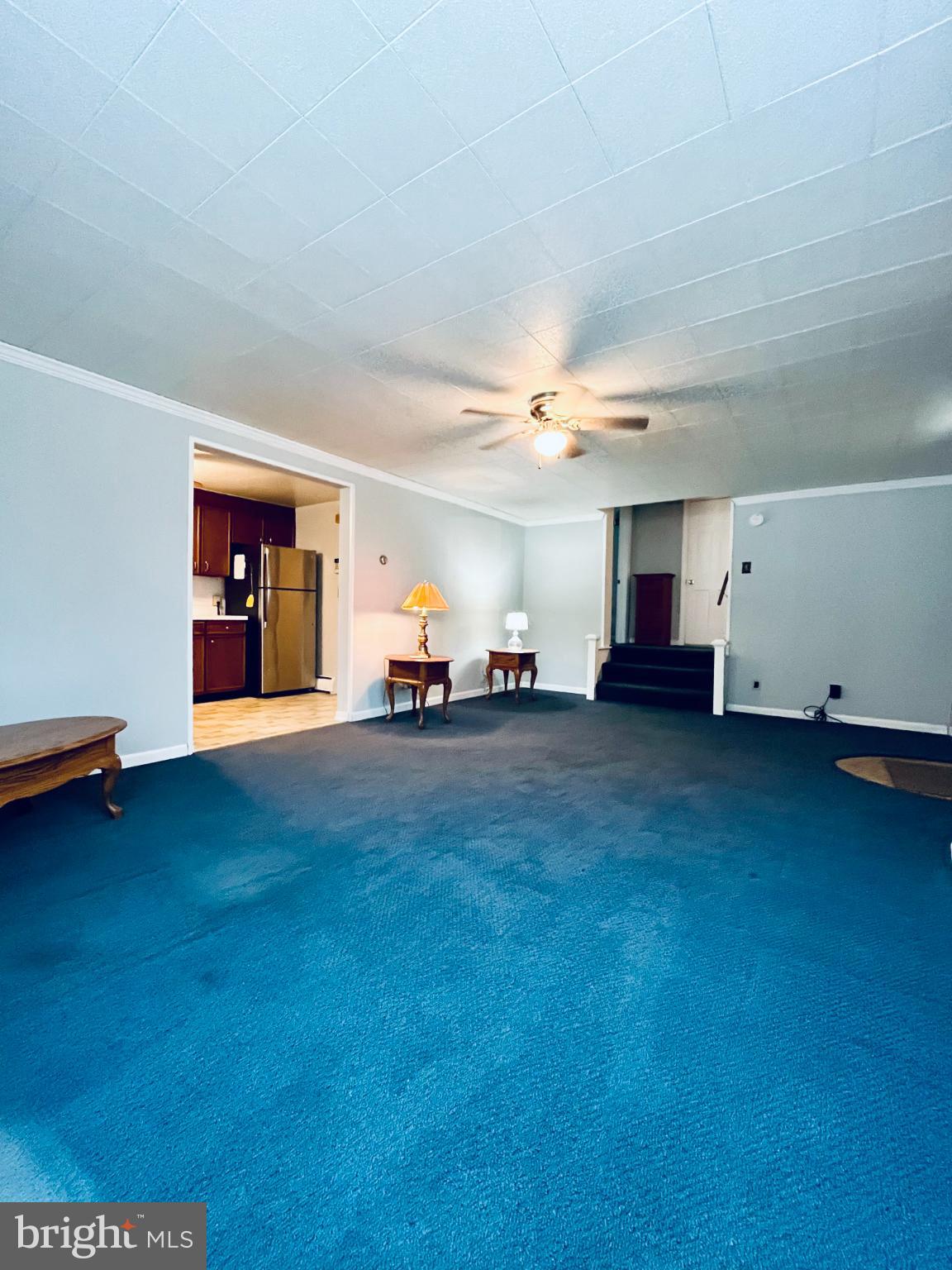 2510 Whiteford Road Whiteford, MD 21160 - Photo 9 of 22 a living room with furniture and a flat screen tv