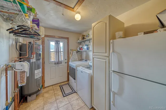 a view of a house with a snow in the yard