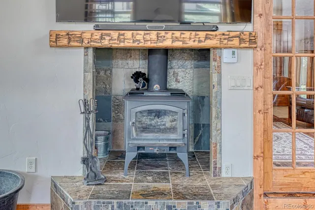 a stove top oven sitting inside of a kitchen