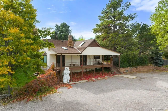 a house with trees in front of it