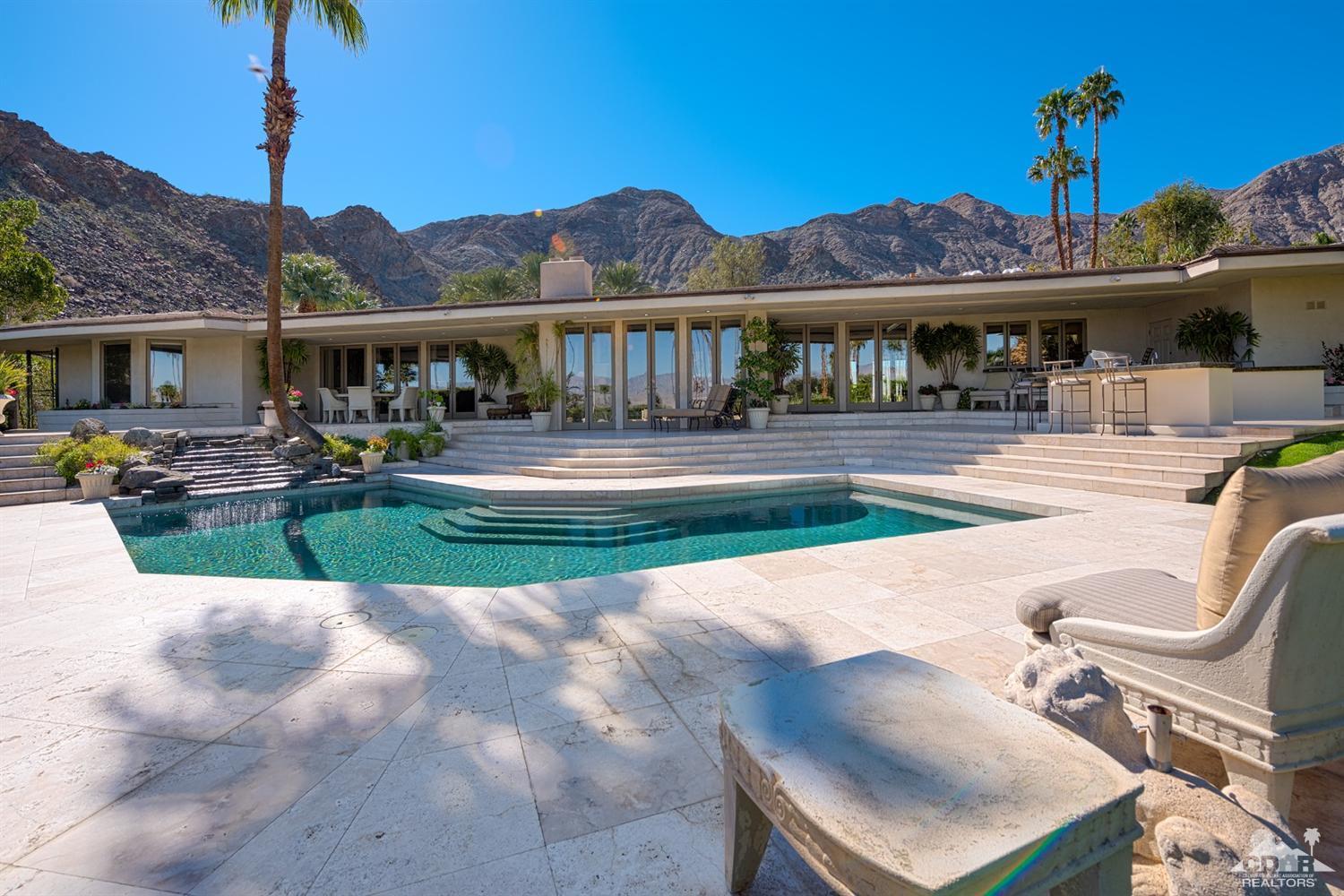 70375 Thunderbird Road Rancho Mirage, CA 92270 - Photo 47 of 54 a view of a house with garden and sitting area
