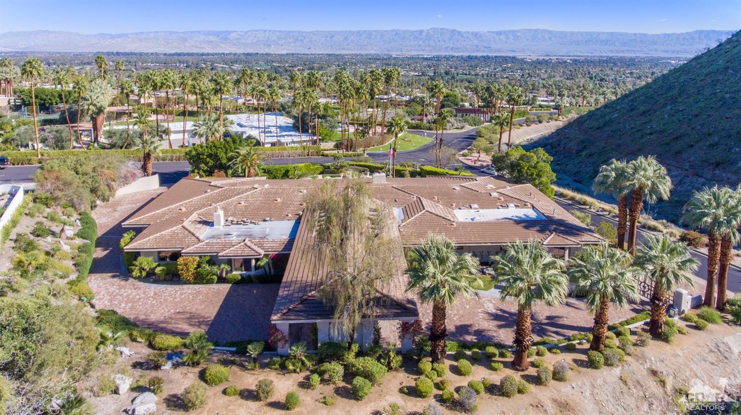 70375 Thunderbird Road Rancho Mirage, CA 92270 - Photo 6 of 54 a view of a city with a lake