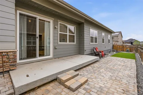 a backyard of a house with seating space
