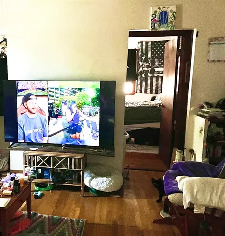 a living room with furniture and rug