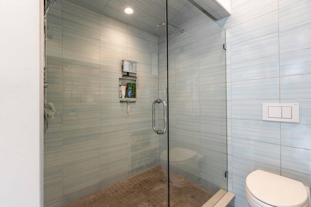 525 Louisa Street Key West, FL 33040 - Photo 38 of 43 a bathroom with a toilet and a shower