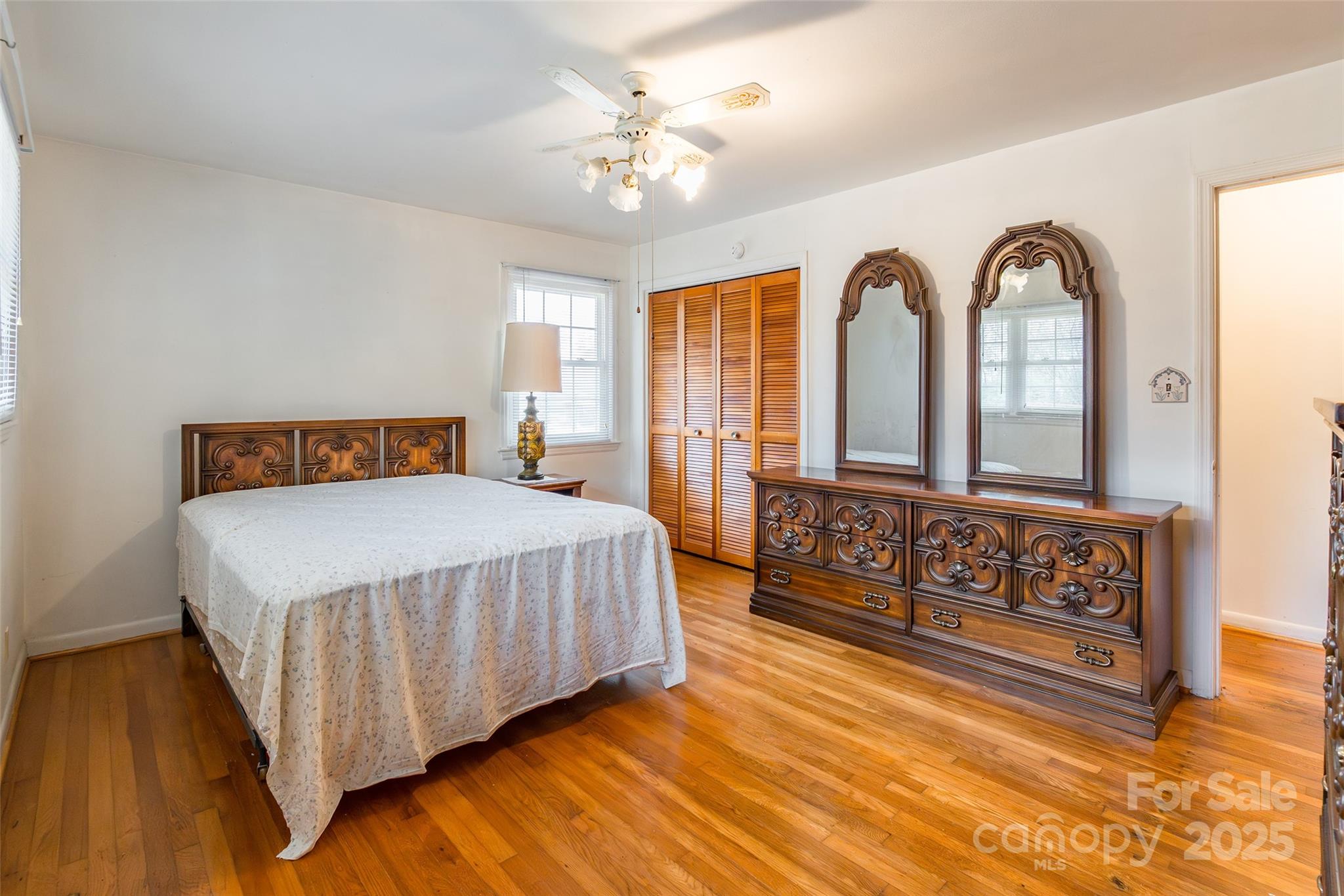2100 J B Denton Road Lancaster, SC 29720 - Photo 16 of 44 a bedroom with a bed and a dresser
