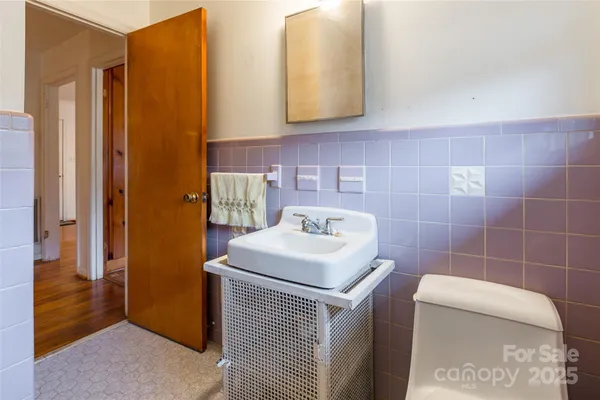 a bathroom with a white bath tub