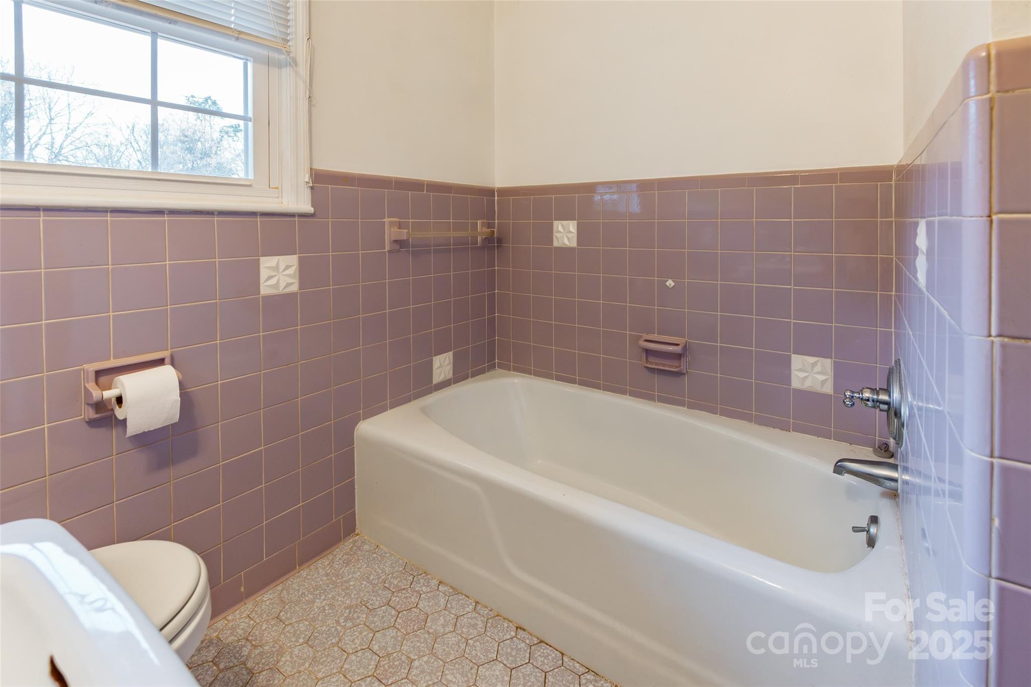 2100 J B Denton Road Lancaster, SC 29720 - Photo 26 of 44 a bathroom with a white bath tub