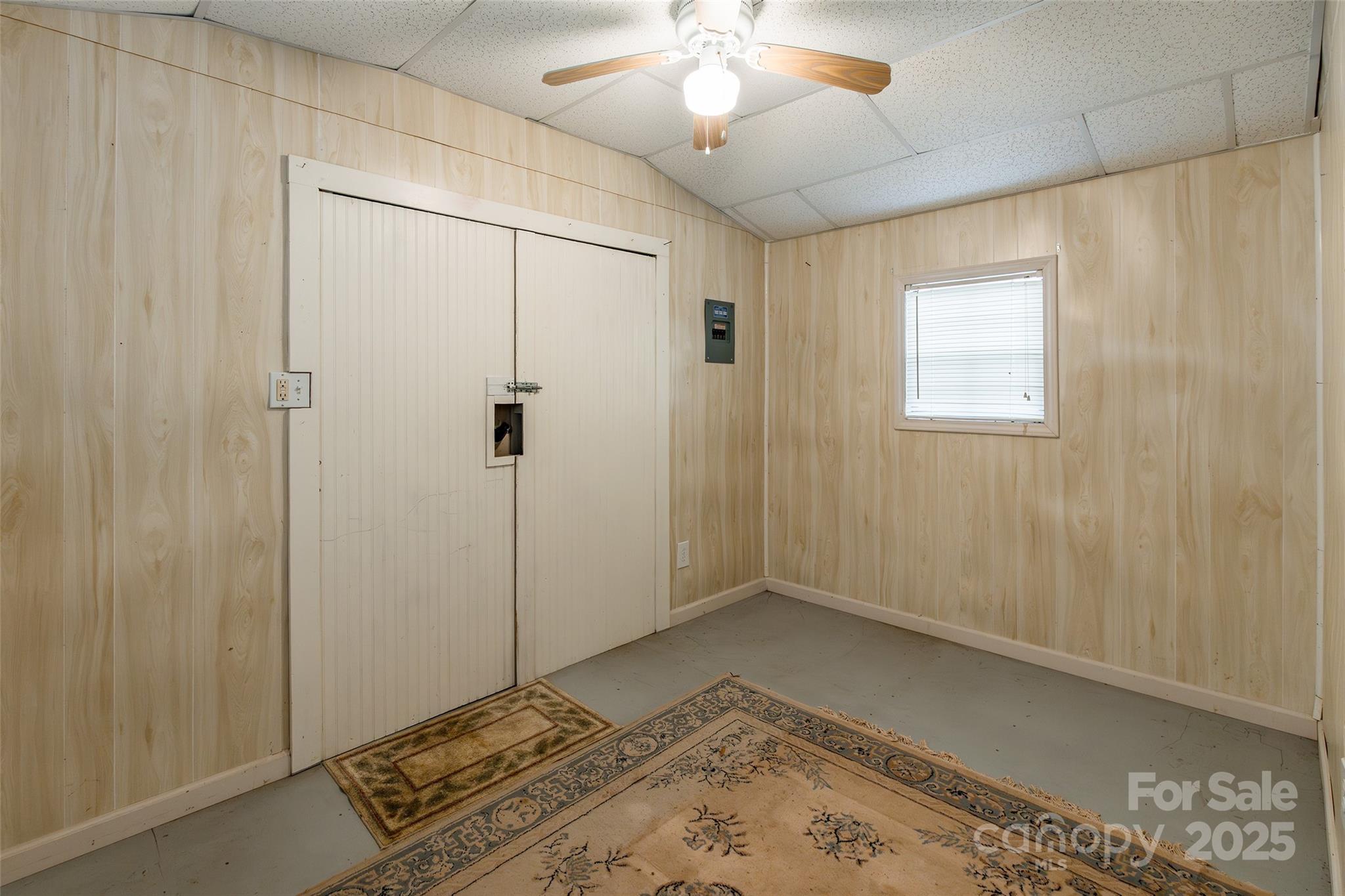 2100 J B Denton Road Lancaster, SC 29720 - Photo 35 of 44 a view of a hallway with a chandelier fan