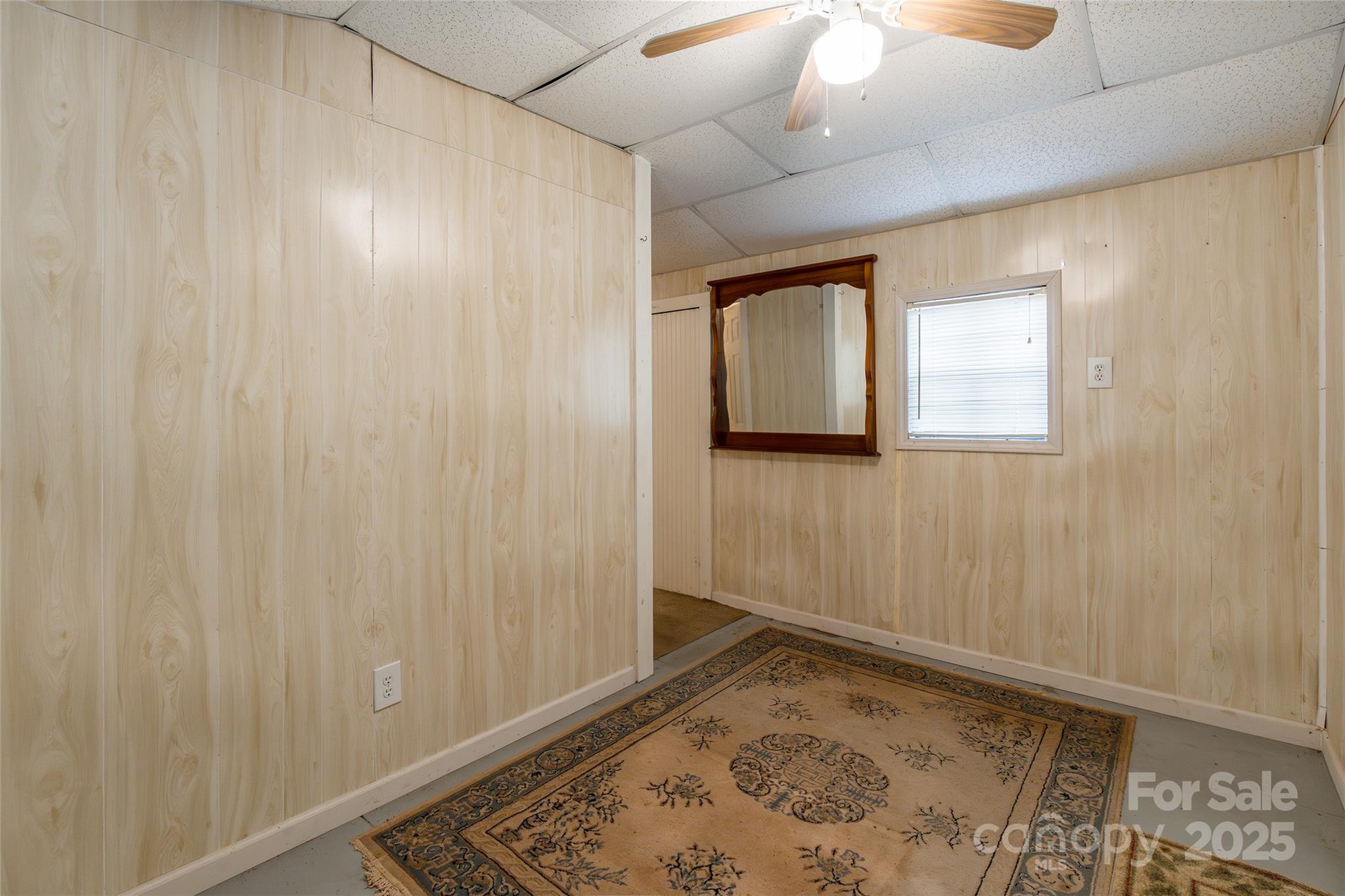 2100 J B Denton Road Lancaster, SC 29720 - Photo 36 of 44 a view of a room with wooden floor and a window