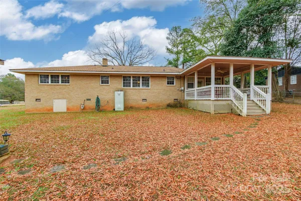 an aerial view of residential house with outdoor space