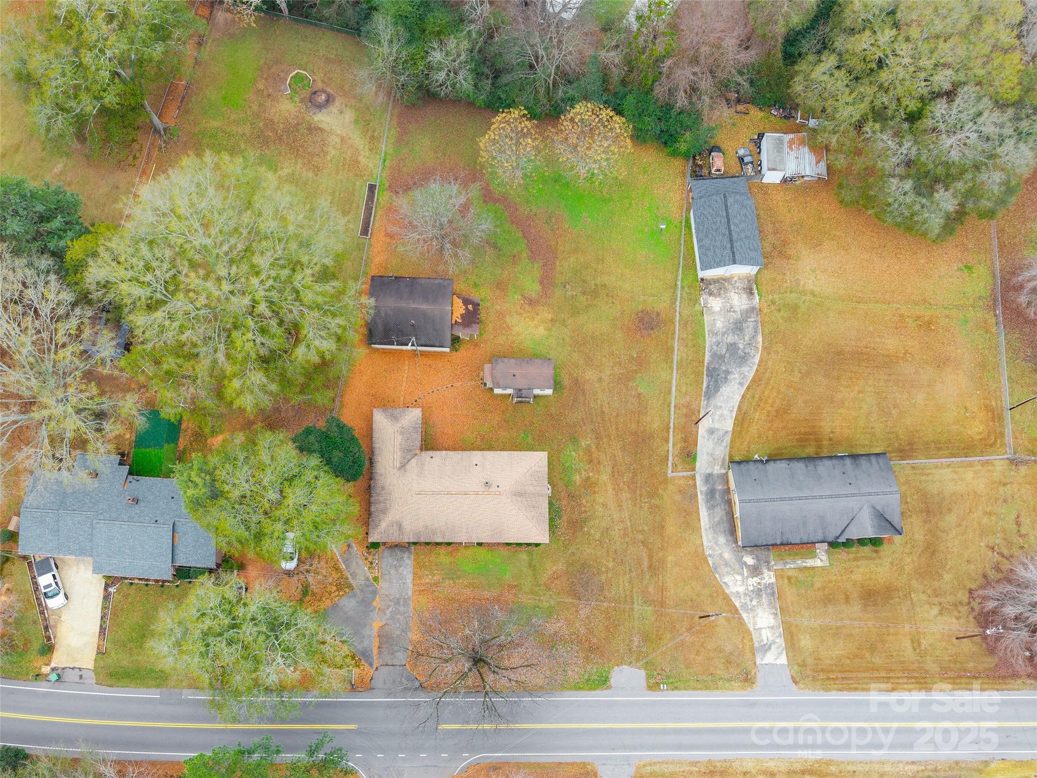 2100 J B Denton Road Lancaster, SC 29720 - Photo 44 of 44 an aerial view of residential houses with outdoor space