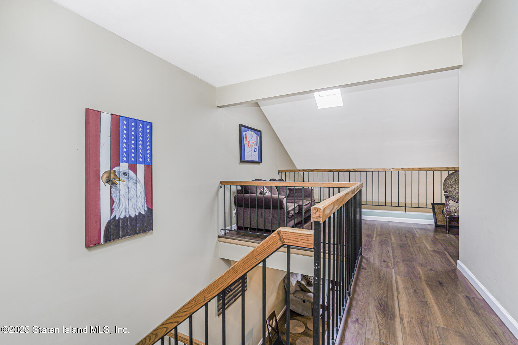 272 Timber Ridge Drive Staten Island, NY 10306 - Photo 16 of 26 a view of staircase with wooden floor and stairs