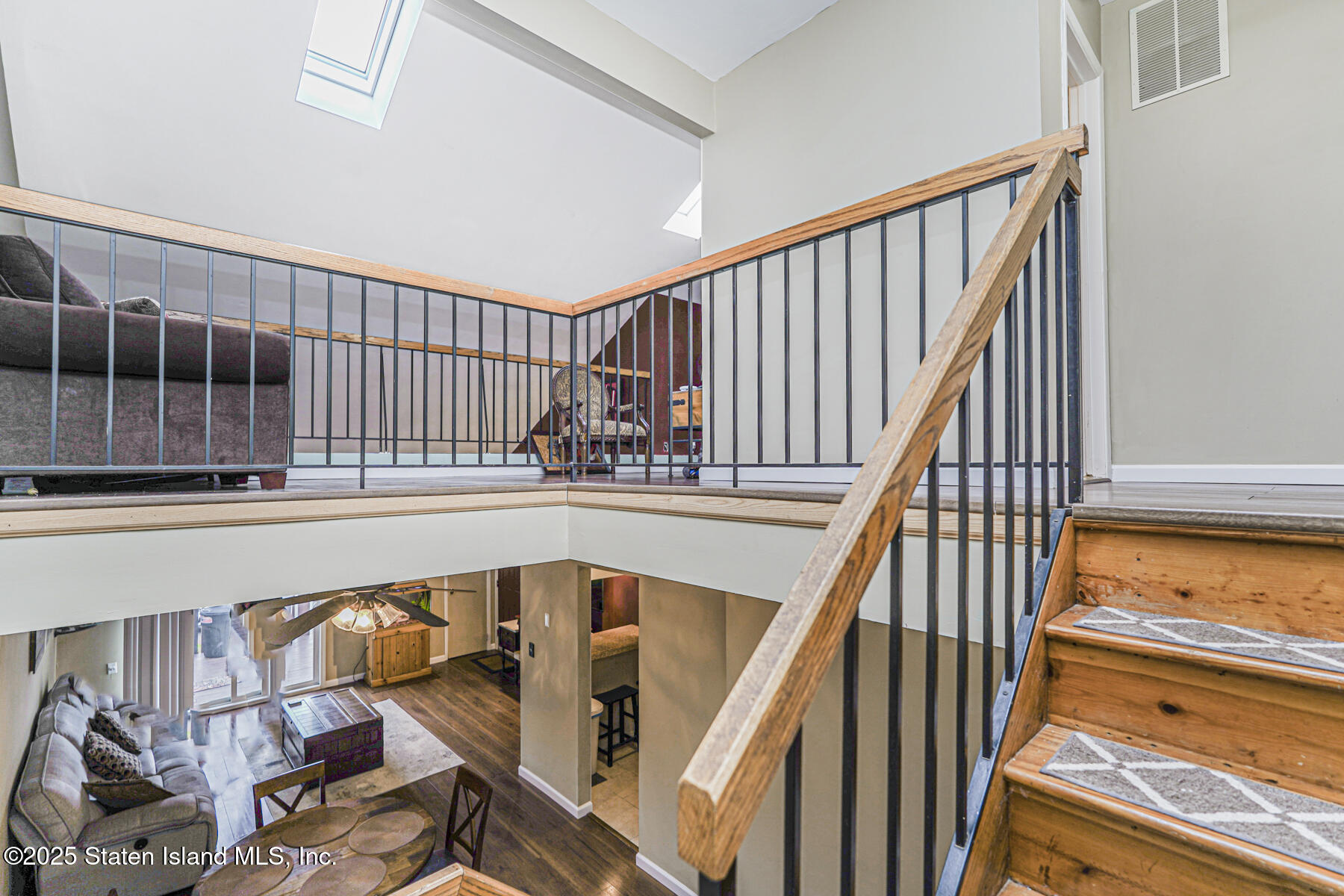 272 Timber Ridge Drive Staten Island, NY 10306 - Photo 20 of 26 a view of staircase with railing and white walls