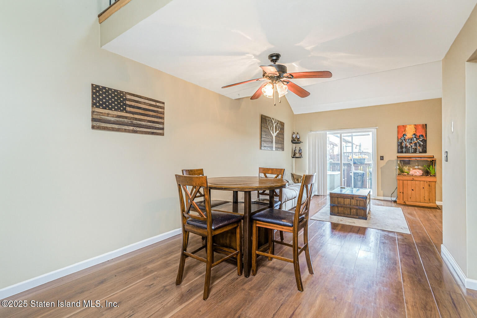272 Timber Ridge Drive Staten Island, NY 10306 - Photo 23 of 26 a view of a dining room with furniture window and wooden floor