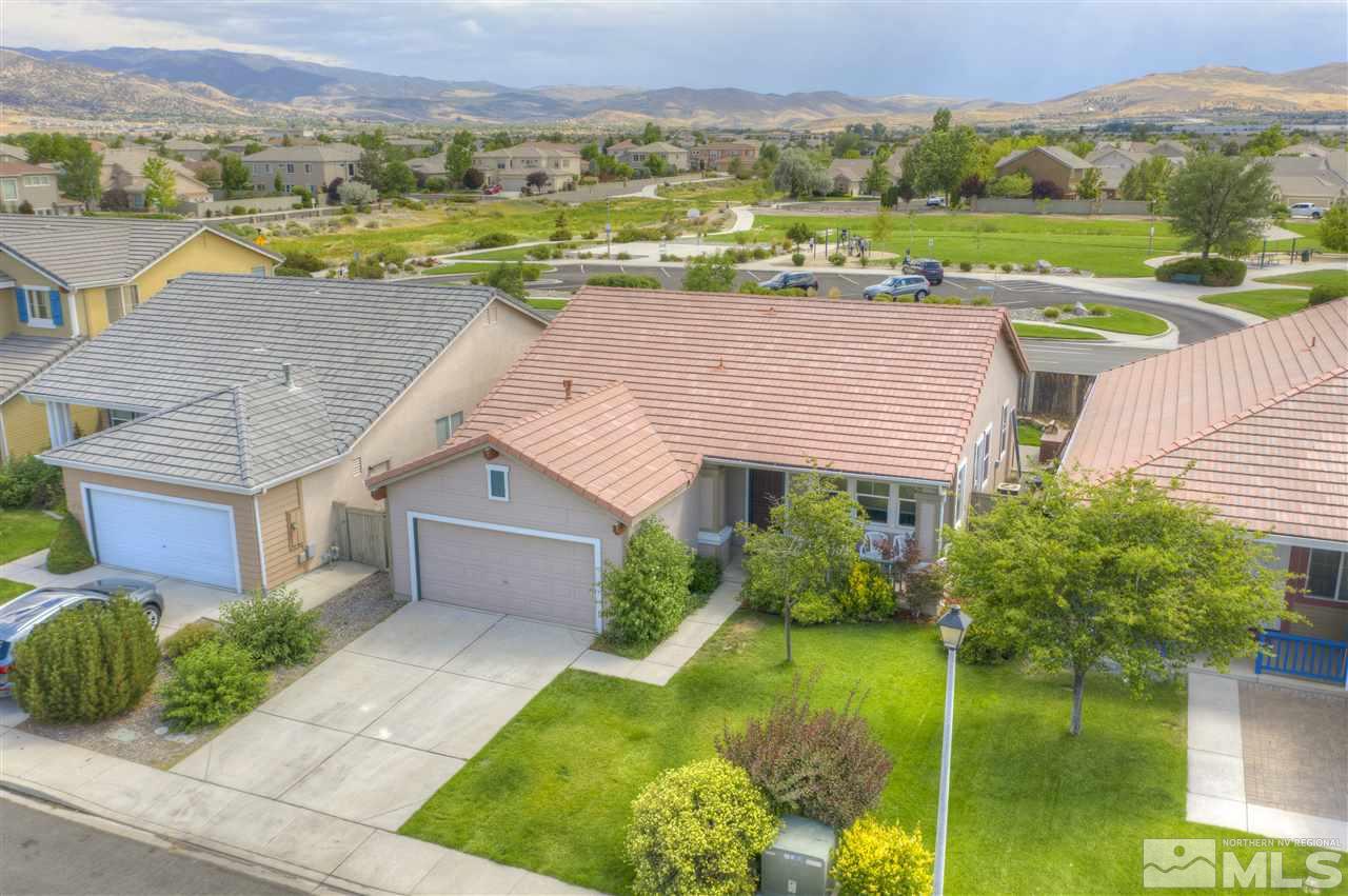 1660 Cattlemen Court Reno, NV 89521 - Photo 2 of 21 a view of a house with a yard and a garden