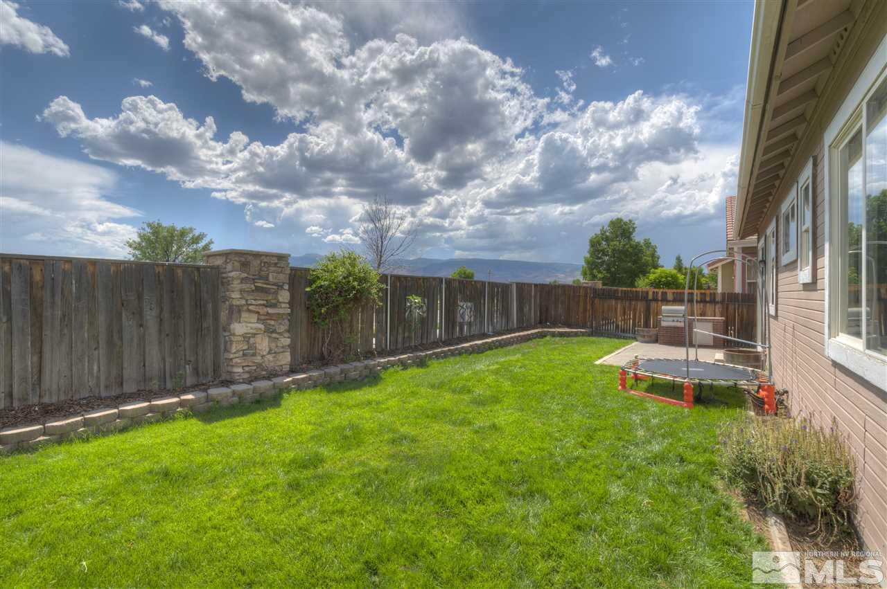 1660 Cattlemen Court Reno, NV 89521 - Photo 4 of 21 a view of a backyard with sitting area