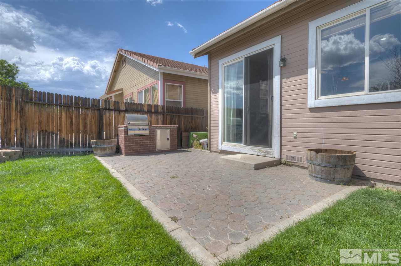 1660 Cattlemen Court Reno, NV 89521 - Photo 6 of 21 a view of a house with backyard and a garden