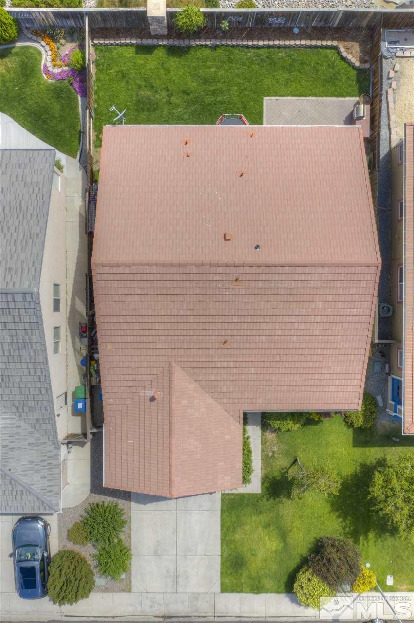 1660 Cattlemen Court Reno, NV 89521 - Photo 7 of 21 a view of an house with backyard space and garden