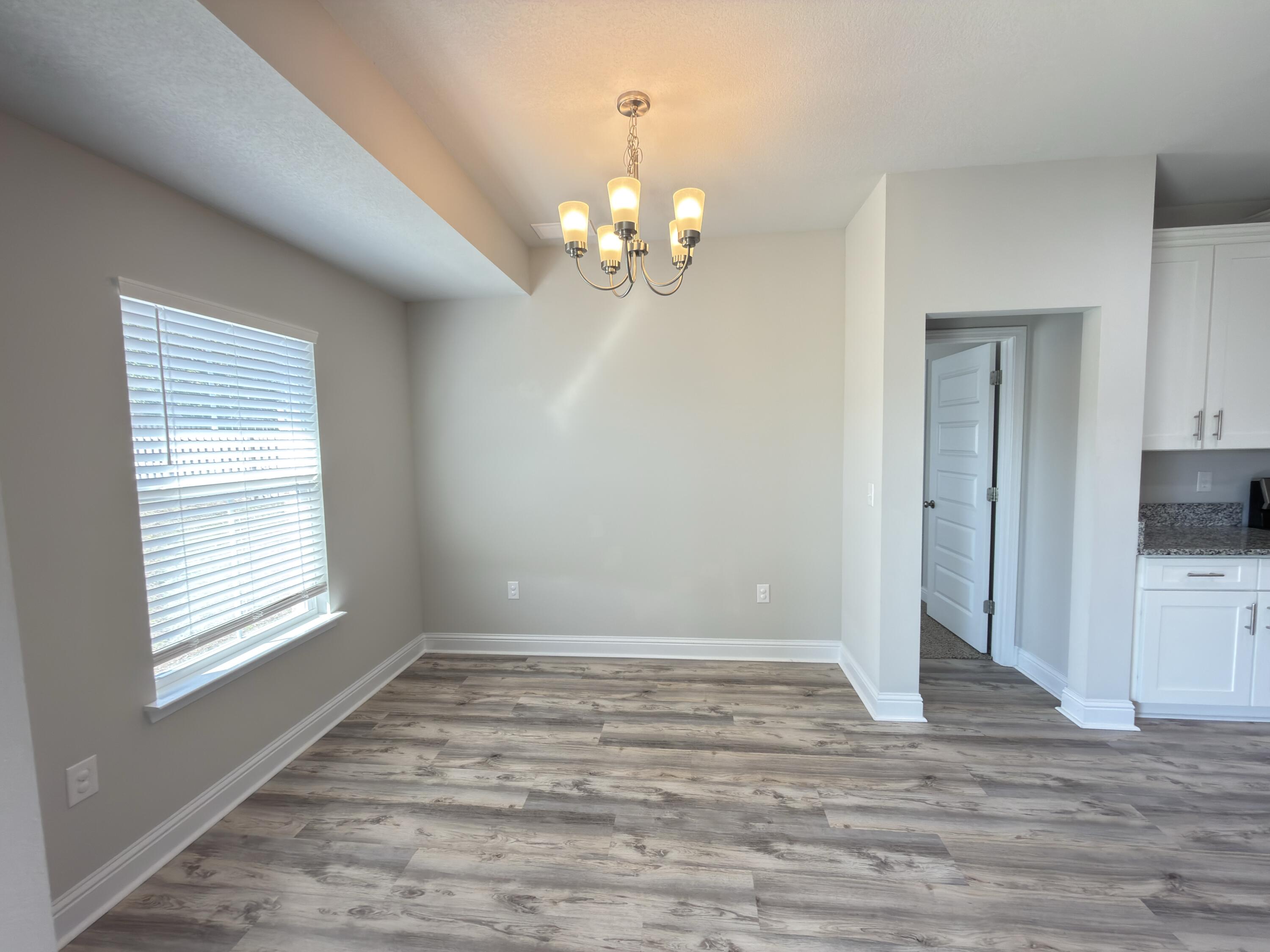 5281 Moore Loop Crestview, FL 32536 - Photo 22 of 28 a view of an empty room with a window