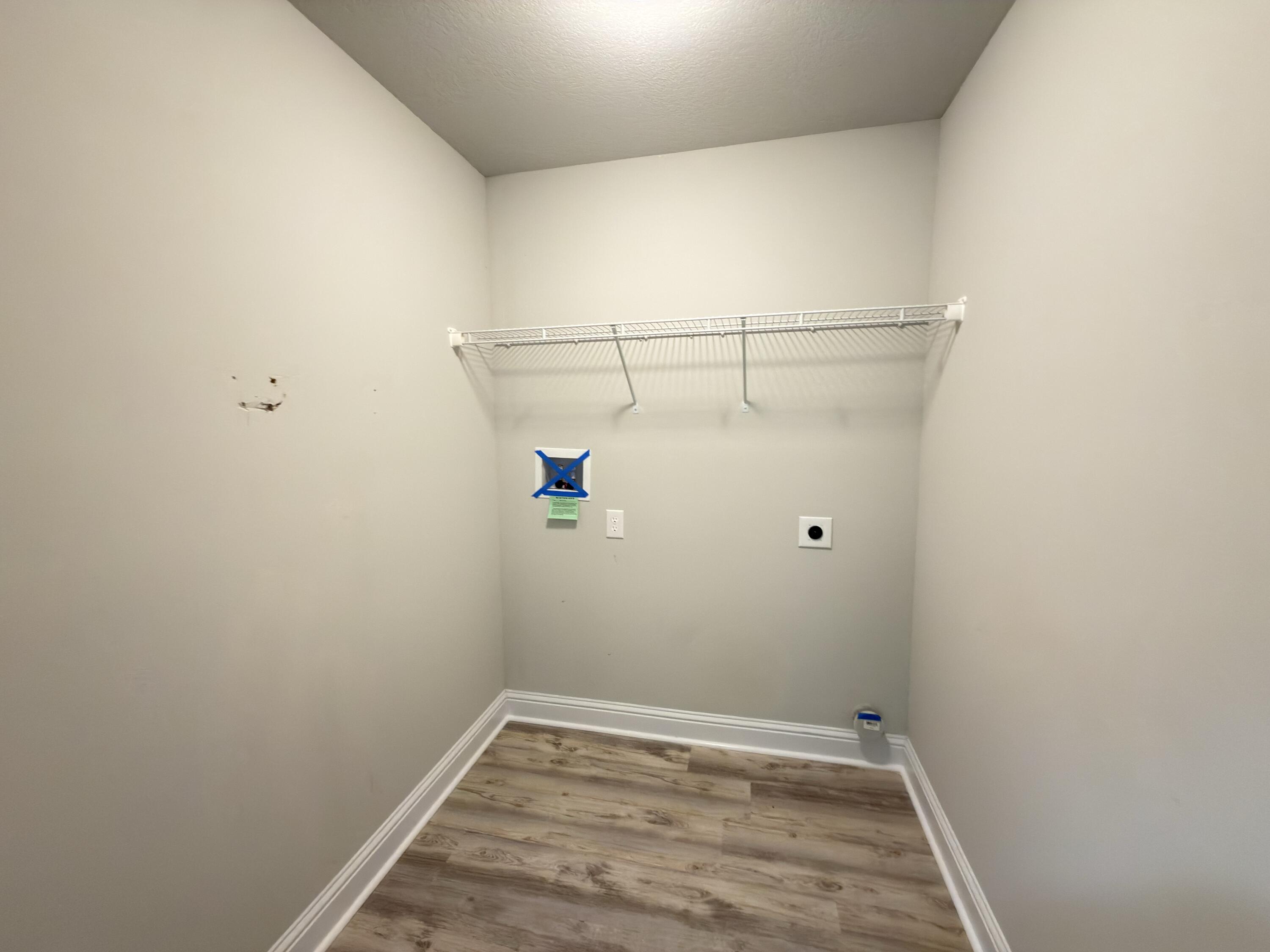 5281 Moore Loop Crestview, FL 32536 - Photo 25 of 28 a view of a room with racks on the wall