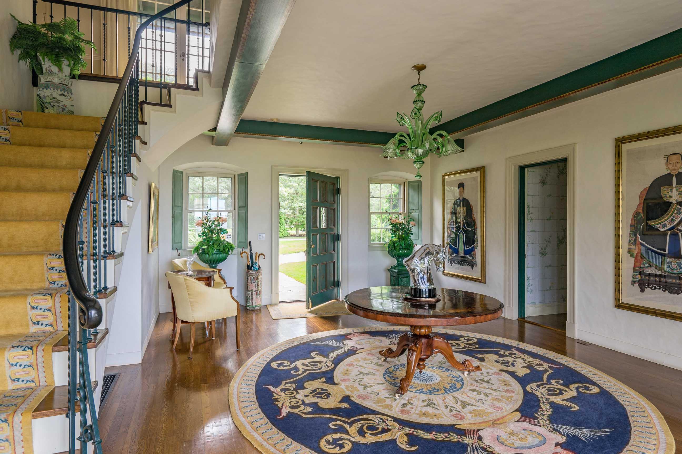 986 Sea View Avenue Osterville, MA 02655 - Photo 11 of 35 a living room with furniture and a chandelier