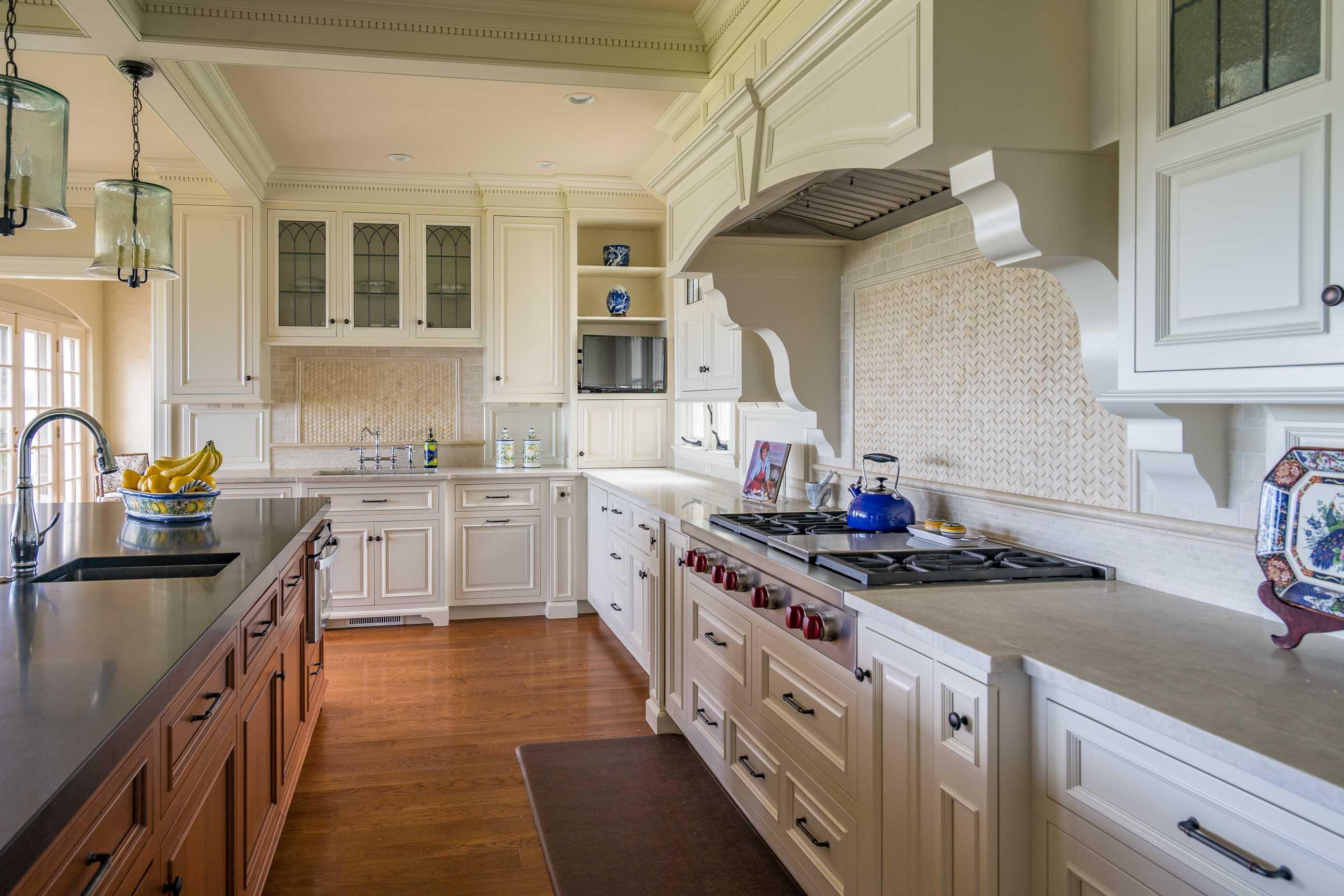 986 Sea View Avenue Osterville, MA 02655 - Photo 16 of 35 a kitchen with stainless steel appliances granite countertop a sink stove and cabinets