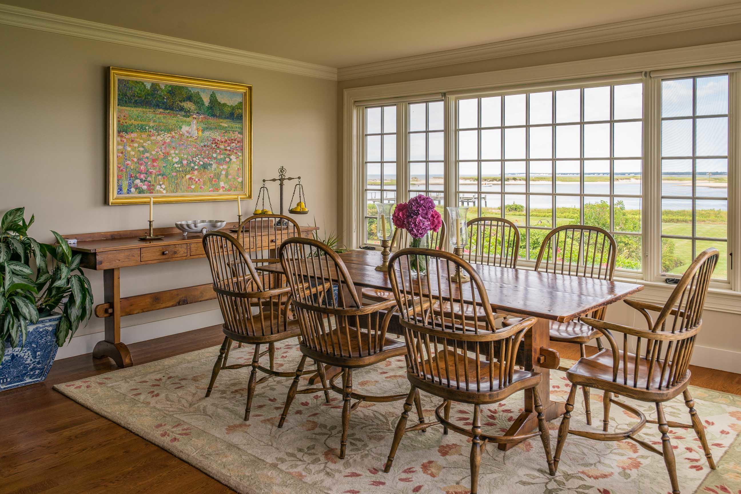 986 Sea View Avenue Osterville, MA 02655 - Photo 17 of 35 a view of a dining room with furniture window and wooden floor