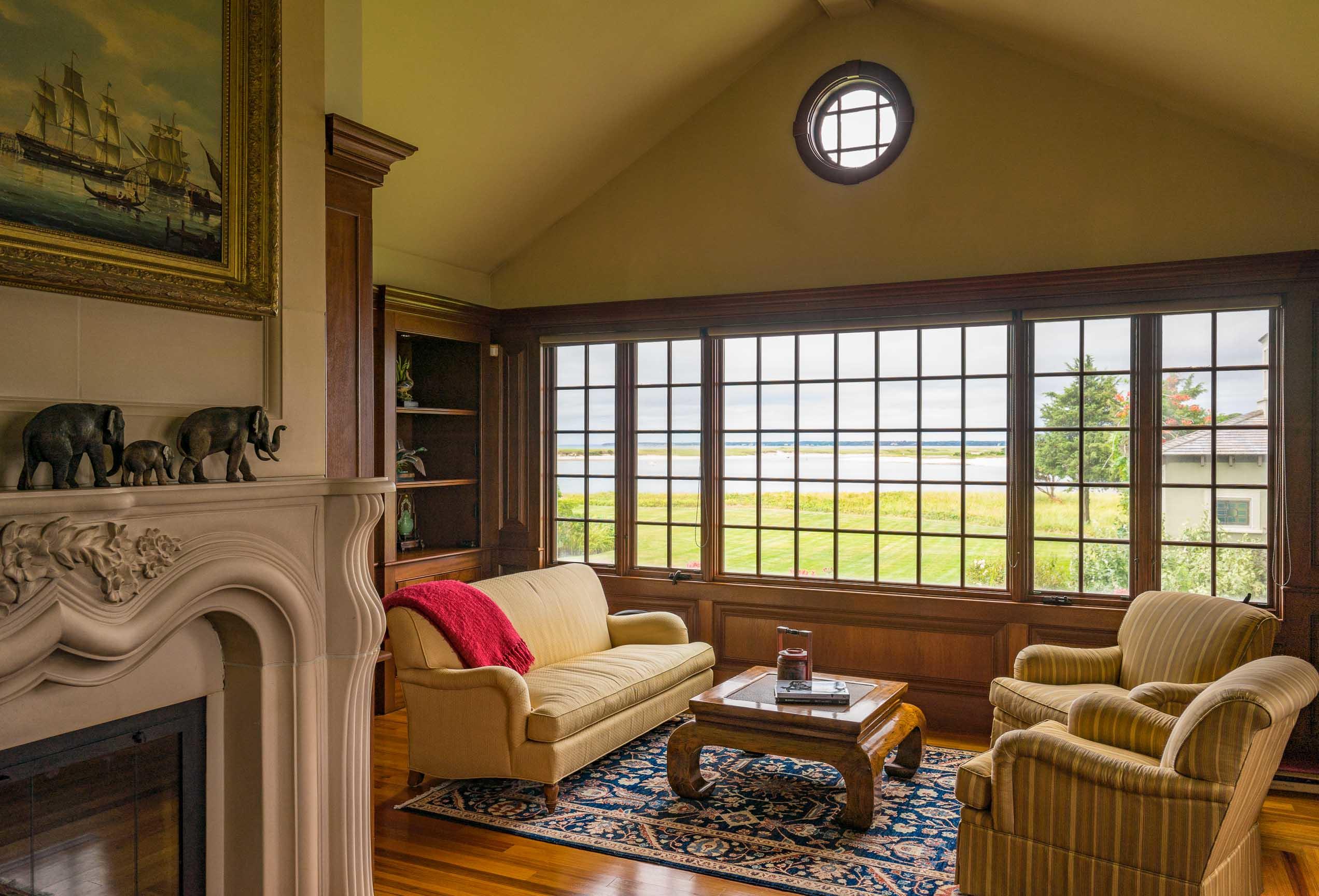 986 Sea View Avenue Osterville, MA 02655 - Photo 20 of 35 a living room with furniture and a floor to ceiling window