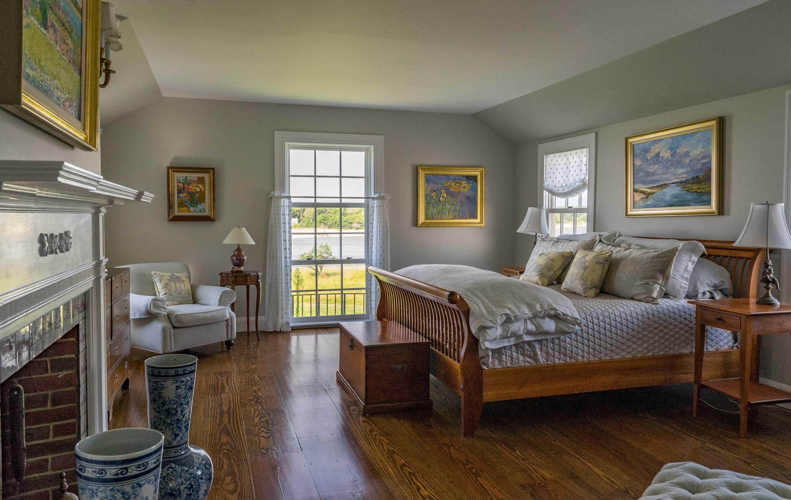 986 Sea View Avenue Osterville, MA 02655 - Photo 24 of 35 a bedroom with a bed and a couch