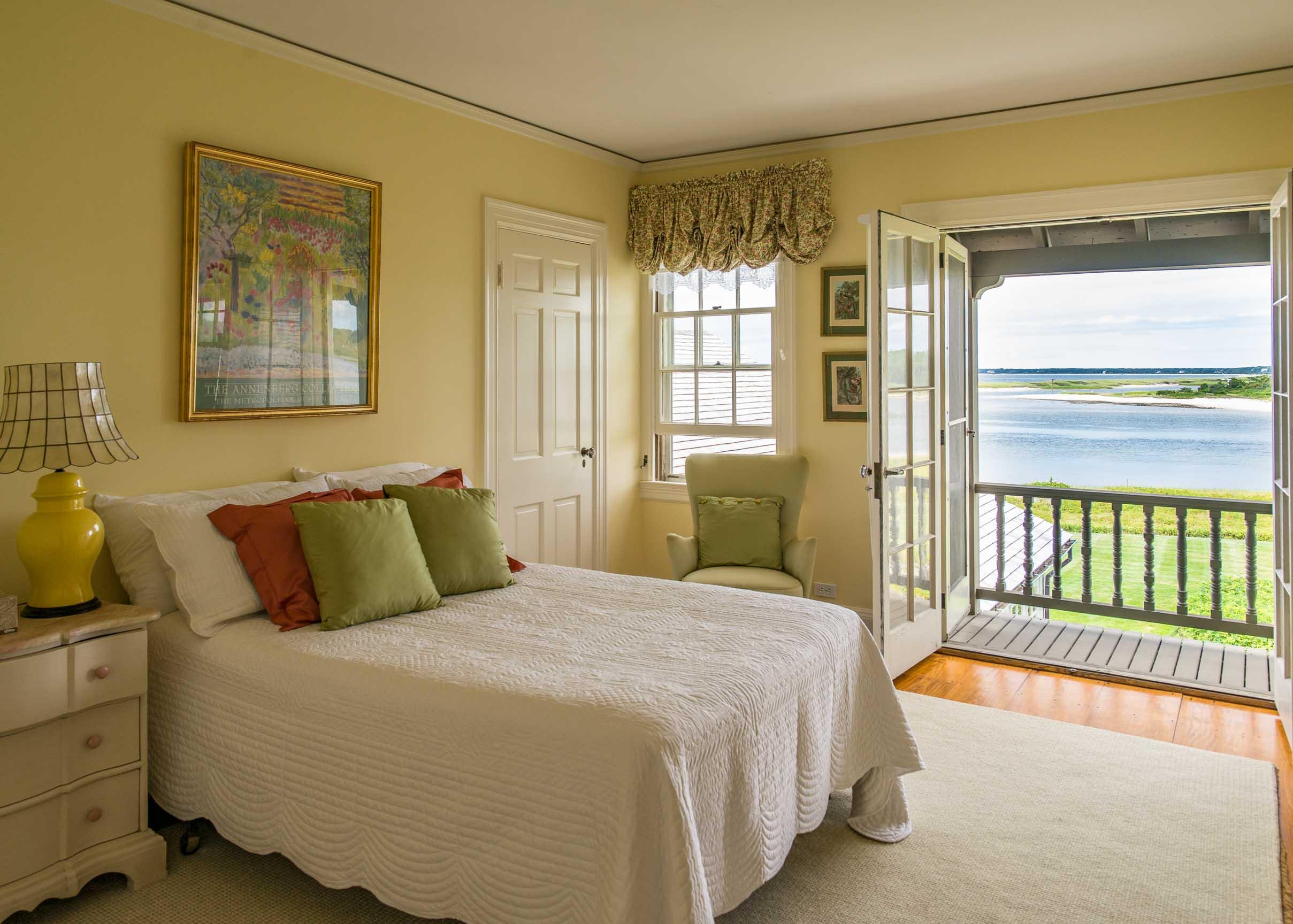 986 Sea View Avenue Osterville, MA 02655 - Photo 28 of 35 a bedroom with a bed and wooden floor