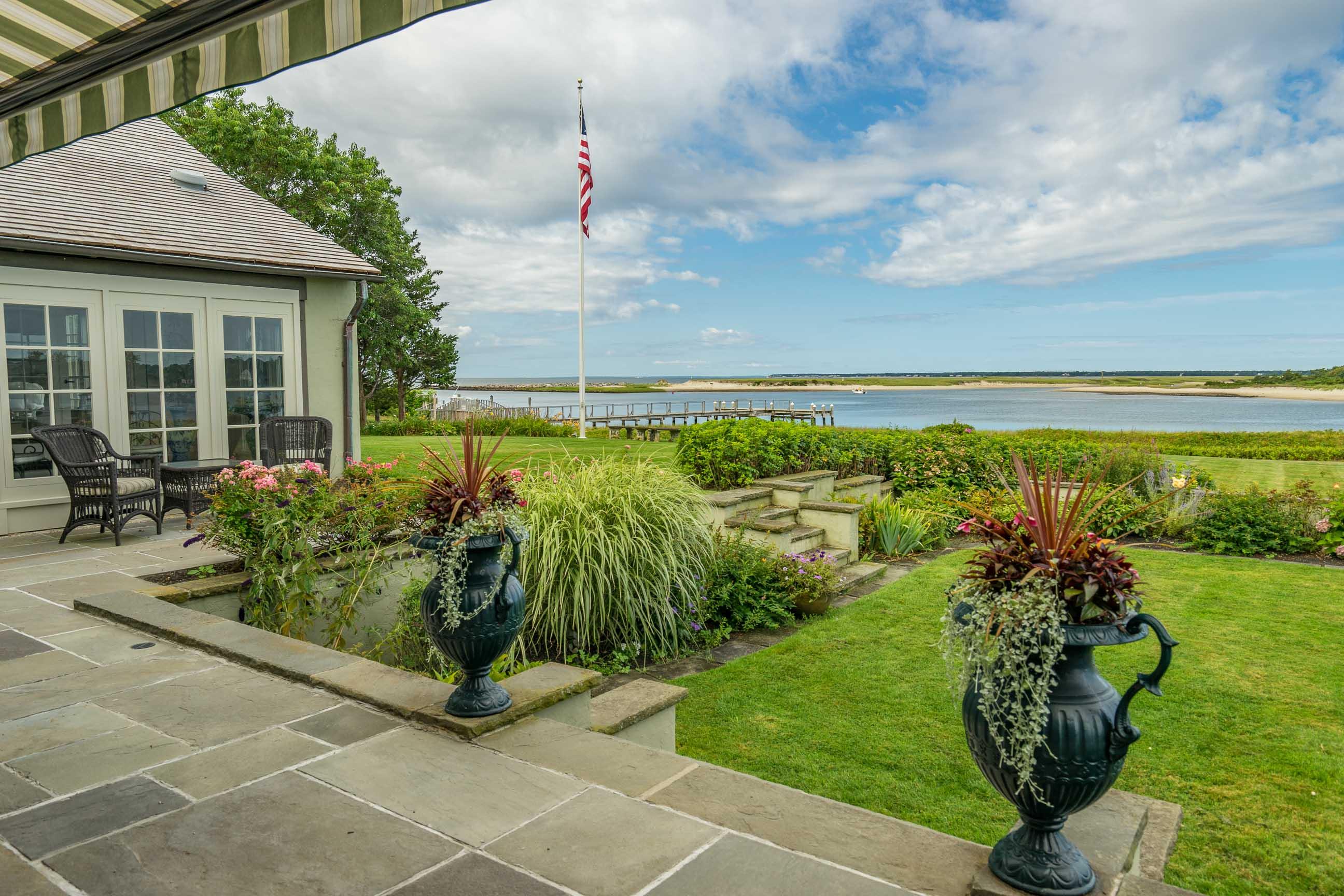 986 Sea View Avenue Osterville, MA 02655 - Photo 29 of 35 a front view of a house with a yard