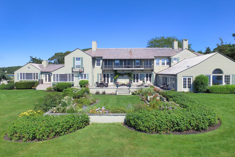 986 Sea View Avenue Osterville, MA 02655 - Photo 32 of 35 a front view of a house with a yard