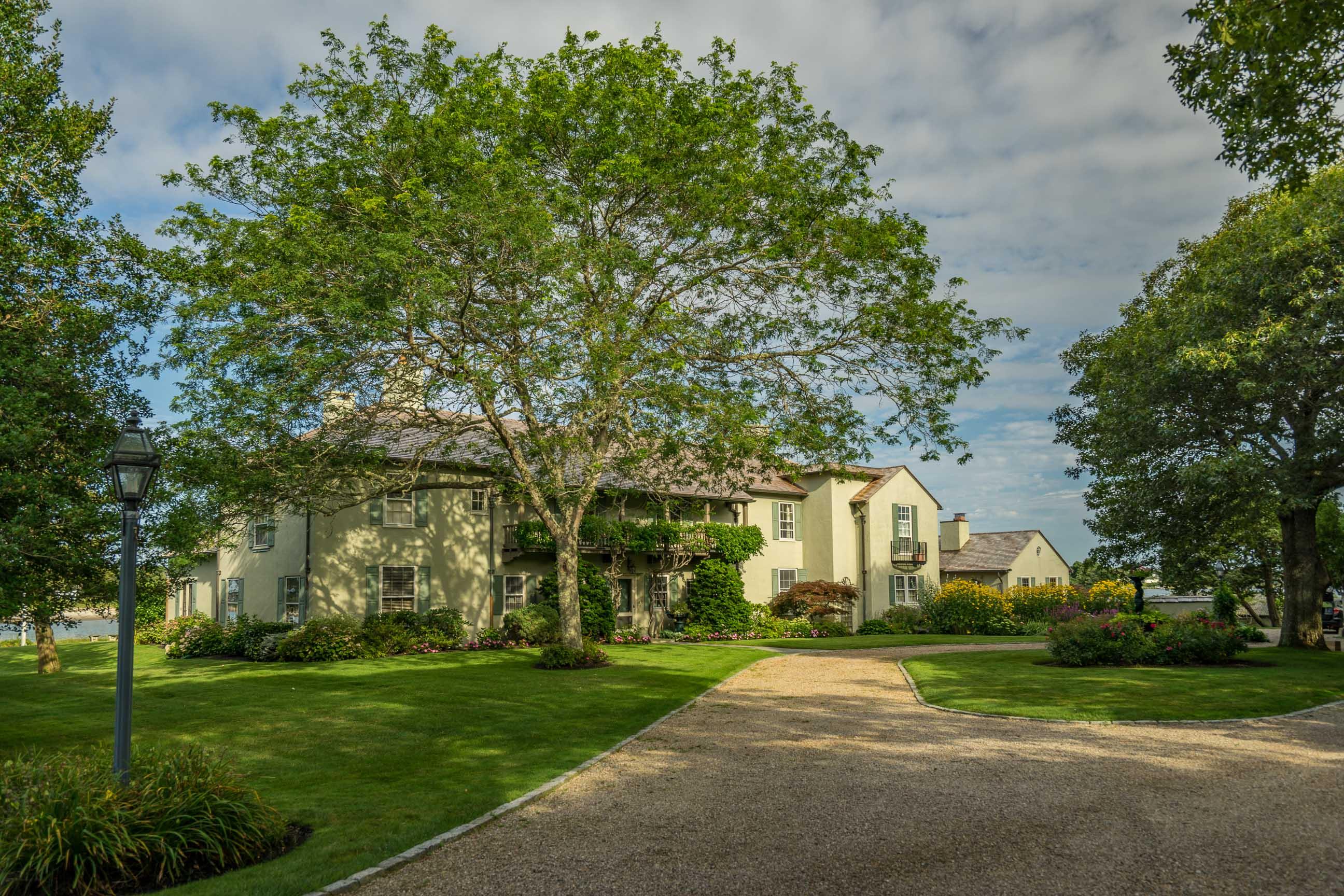 986 Sea View Avenue Osterville, MA 02655 - Photo 4 of 35 a front view of house with yard and green space