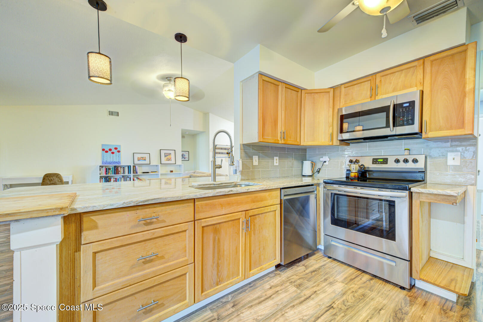 805 Gardener Road Rockledge, FL 32955 - Photo 13 of 38 kitchen with pendant lights (1)