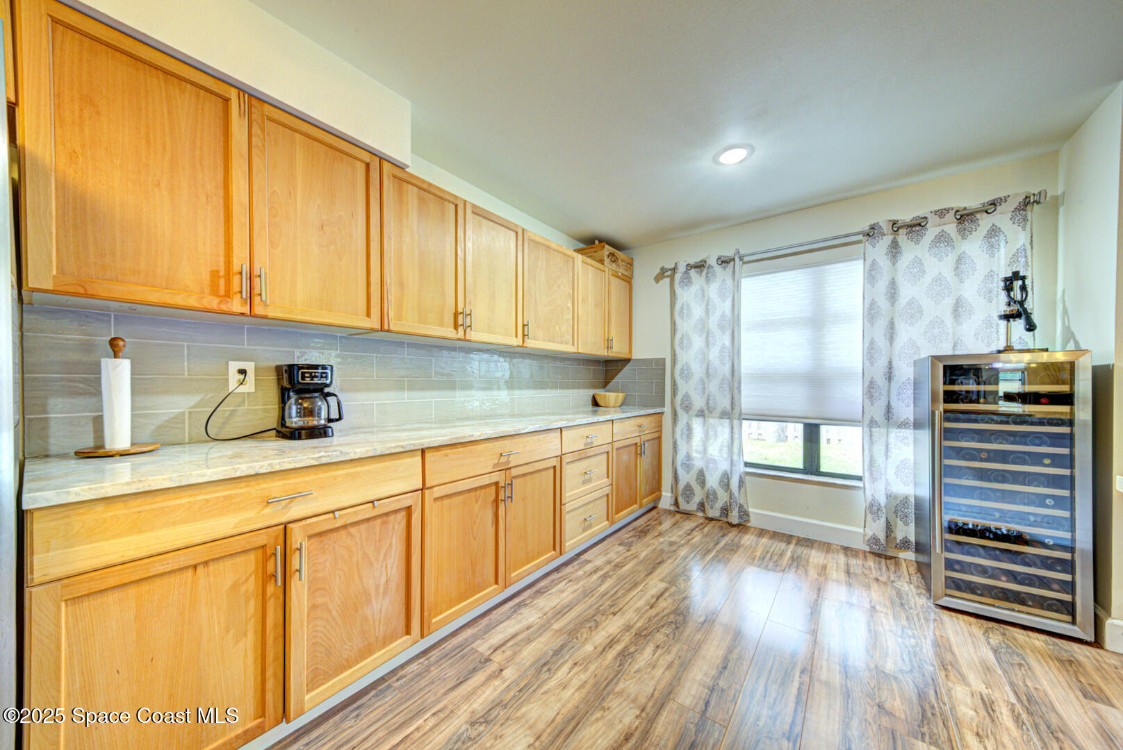 805 Gardener Road Rockledge, FL 32955 - Photo 14 of 38 kitchen with tile backsplash