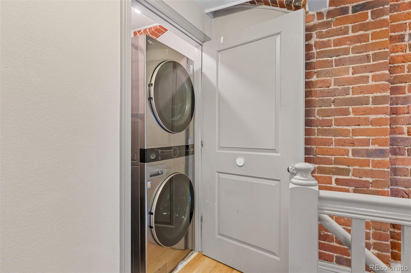 3211 Zuni Street, Unit 9 Denver, CO 80211 - Photo 36 of 36 a utility room with dryer and washer