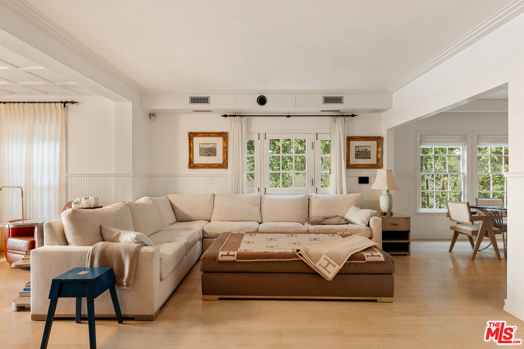 501 Palisades Beach Road Santa Monica, CA 90402 - Photo 8 of 29 a living room with furniture and a large window