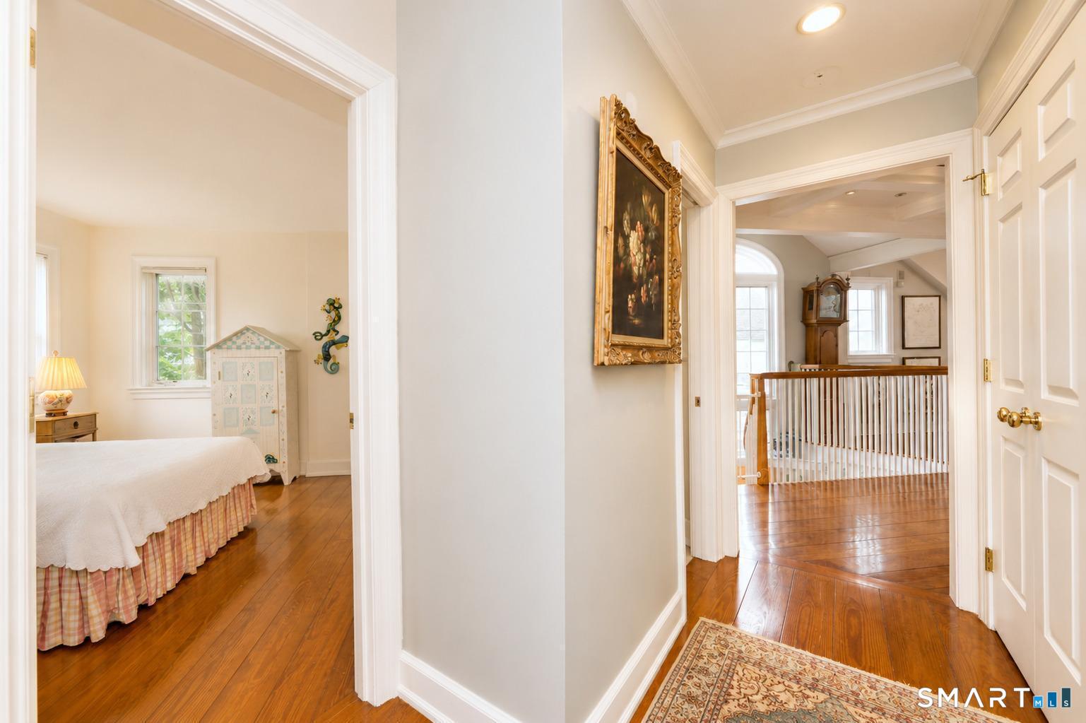 1681 Fairfield Beach Road Fairfield, CT 06824 - Photo 16 of 36 Gracious second-floor gallery connecting the bedroom suite, study, elevator, winding staircase, powder room, and great room. Abundant natural light and beautiful views from nearly every window enhance the home's timeless coastal character.