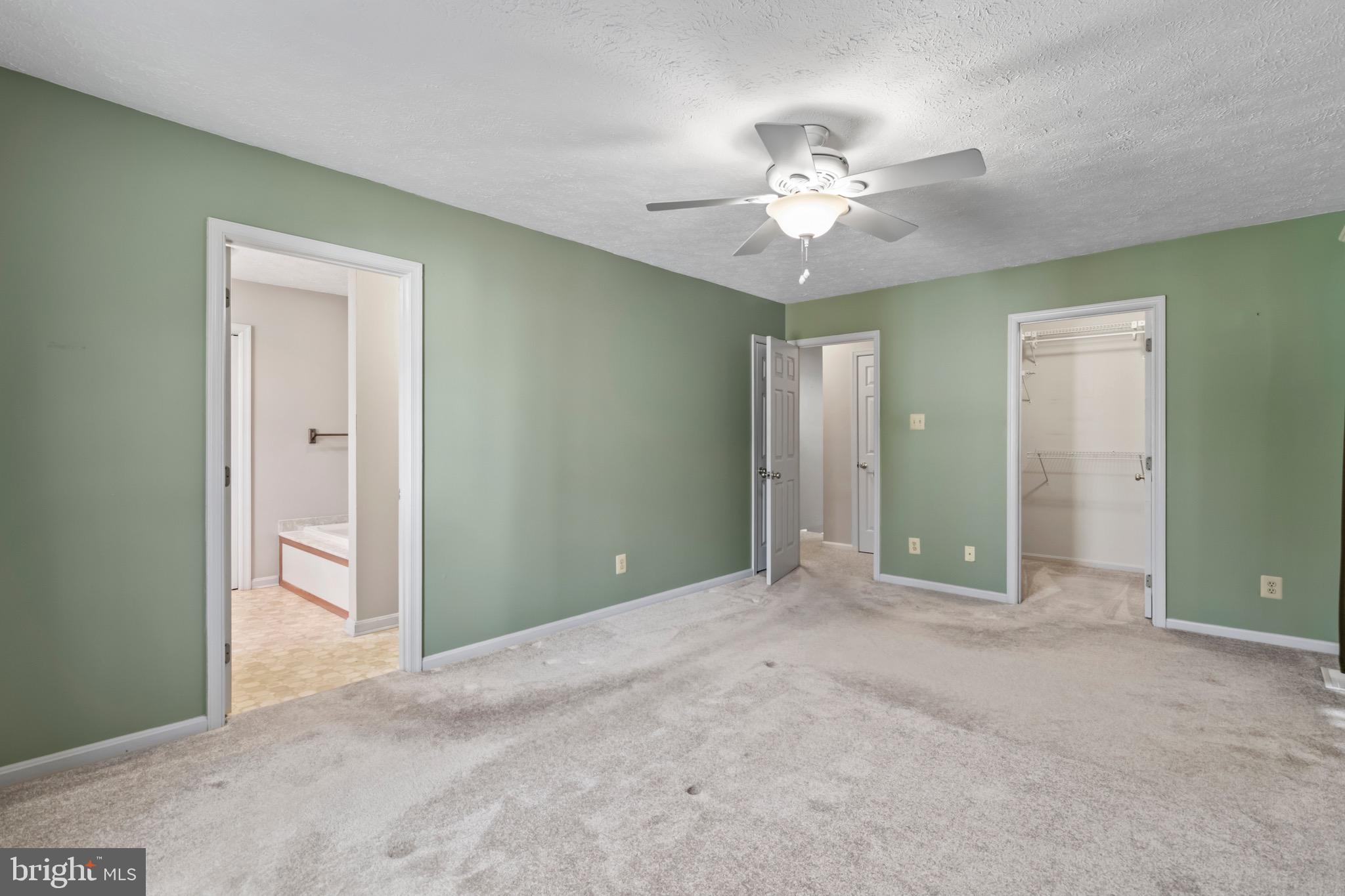 9675 Faith Baptist Church Road White Plains, MD 20695 - Photo 13 of 53 a view of an empty room with a chandelier fan