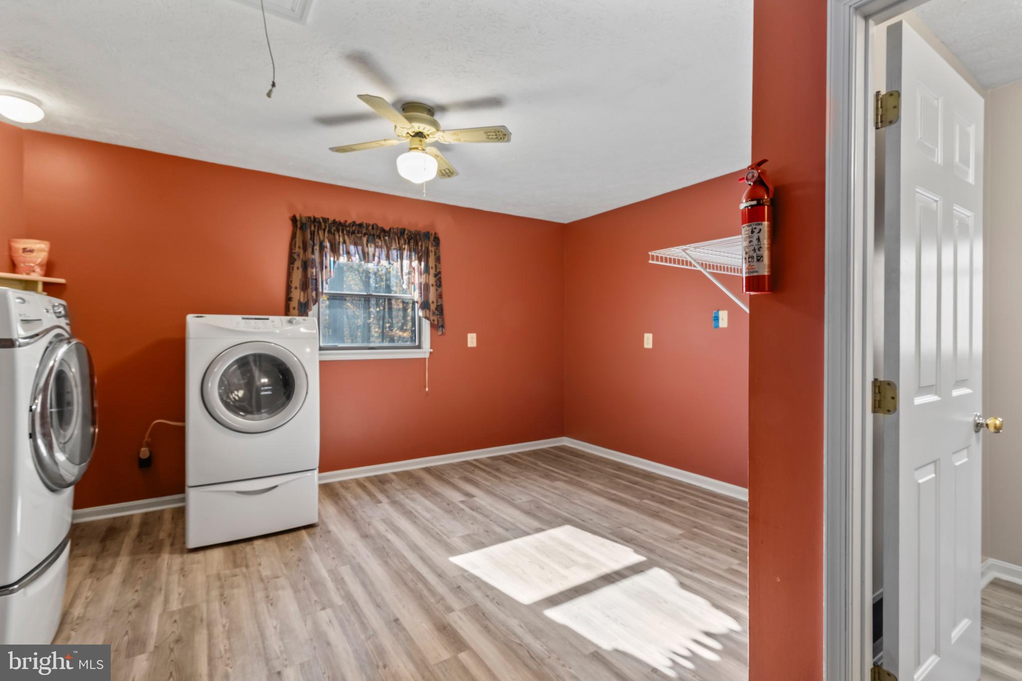 9675 Faith Baptist Church Road White Plains, MD 20695 - Photo 18 of 53 a view of a livingroom with washer and dryer