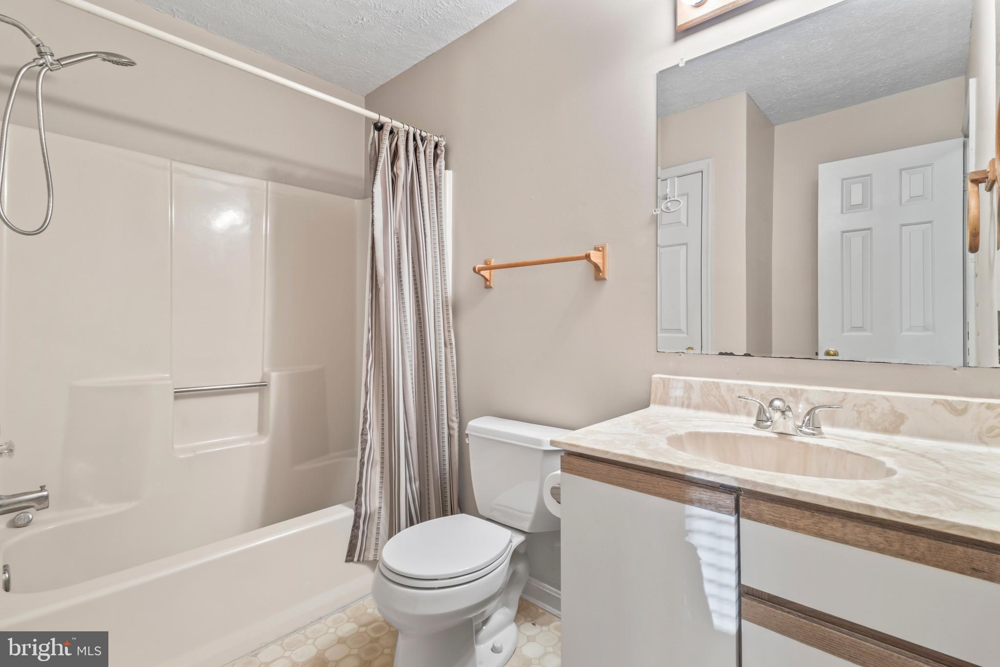 9675 Faith Baptist Church Road White Plains, MD 20695 - Photo 28 of 53 a bathroom with a sink toilet and shower