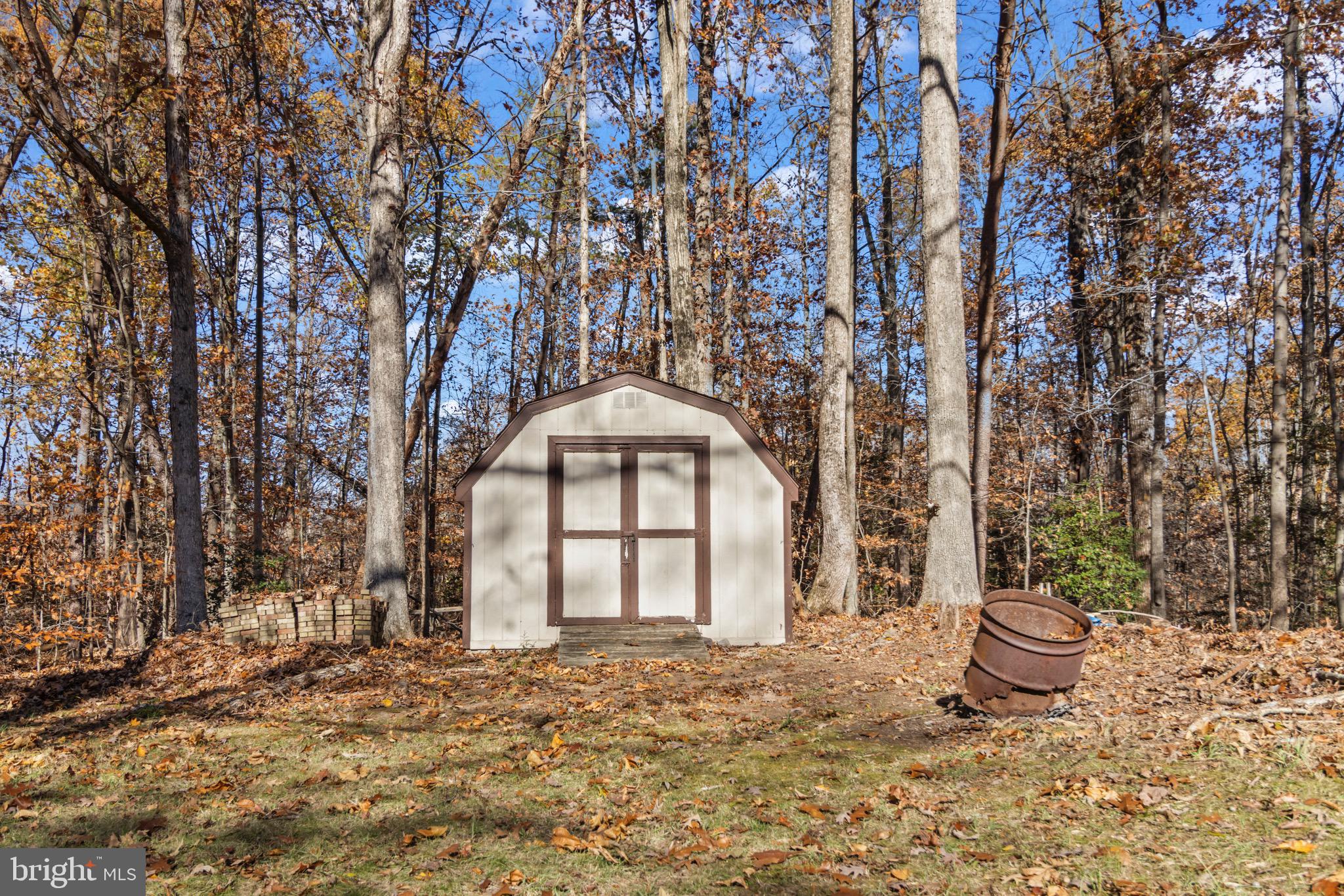 9675 Faith Baptist Church Road White Plains, MD 20695 - Photo 41 of 53 a front view of a house with a yard