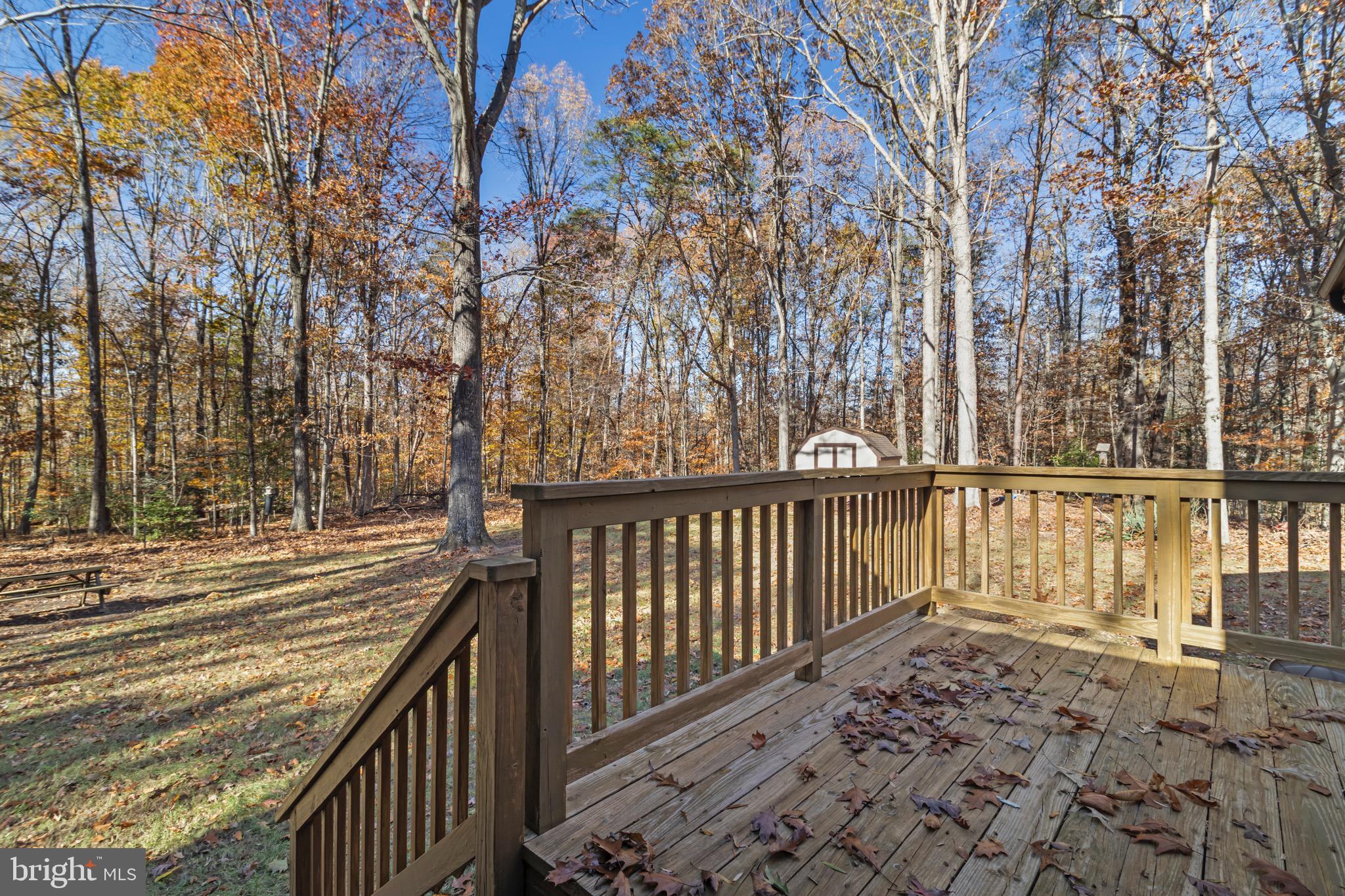 9675 Faith Baptist Church Road White Plains, MD 20695 - Photo 43 of 53 a balcony with wooden floor and fence