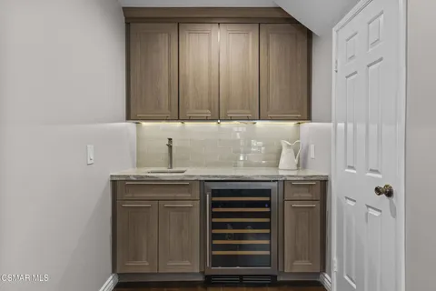 a view of cabinets with wooden cabinets