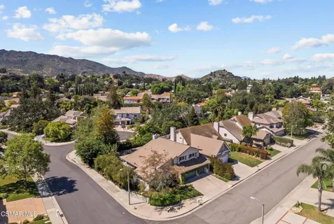 an aerial view of a house with a garden