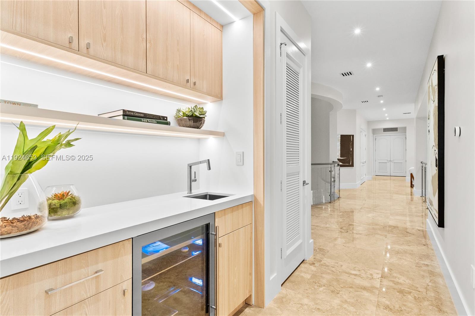6080 Southwest 104th Street Pinecrest, FL 33156 - Photo 15 of 75 a bathroom with a sink a mirror and shower