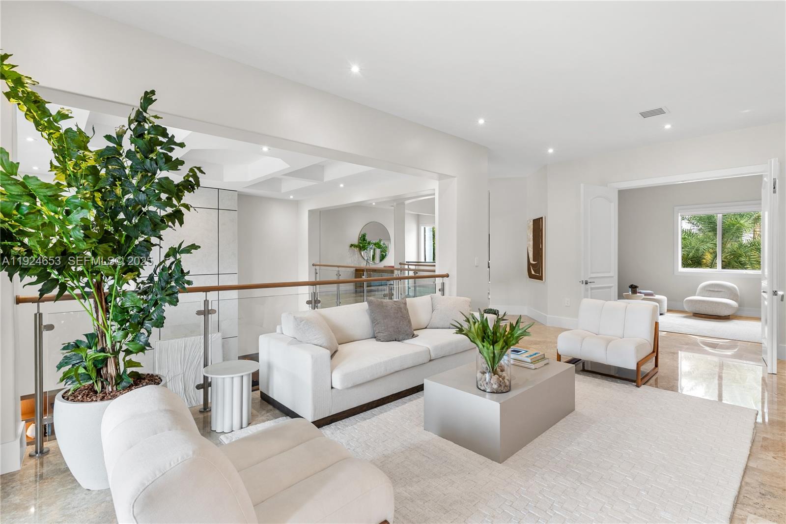 6080 Southwest 104th Street Pinecrest, FL 33156 - Photo 25 of 75 a living room with furniture and a potted plant