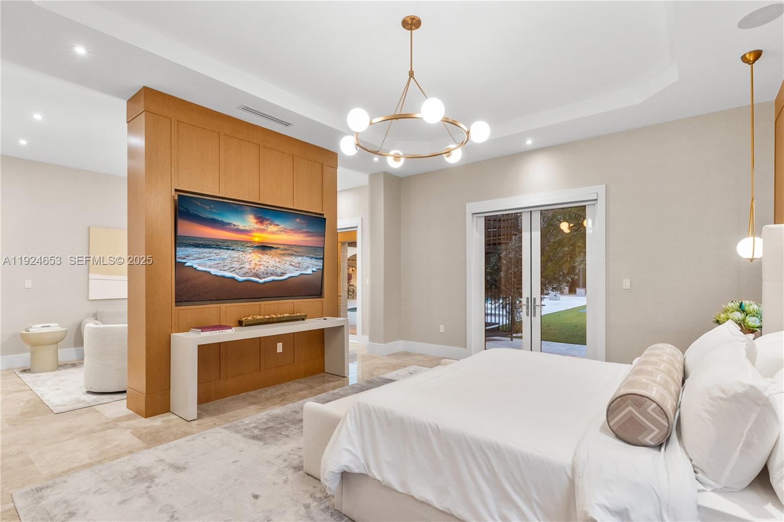 6080 Southwest 104th Street Pinecrest, FL 33156 - Photo 27 of 75 a bedroom with a bed and a flat screen tv