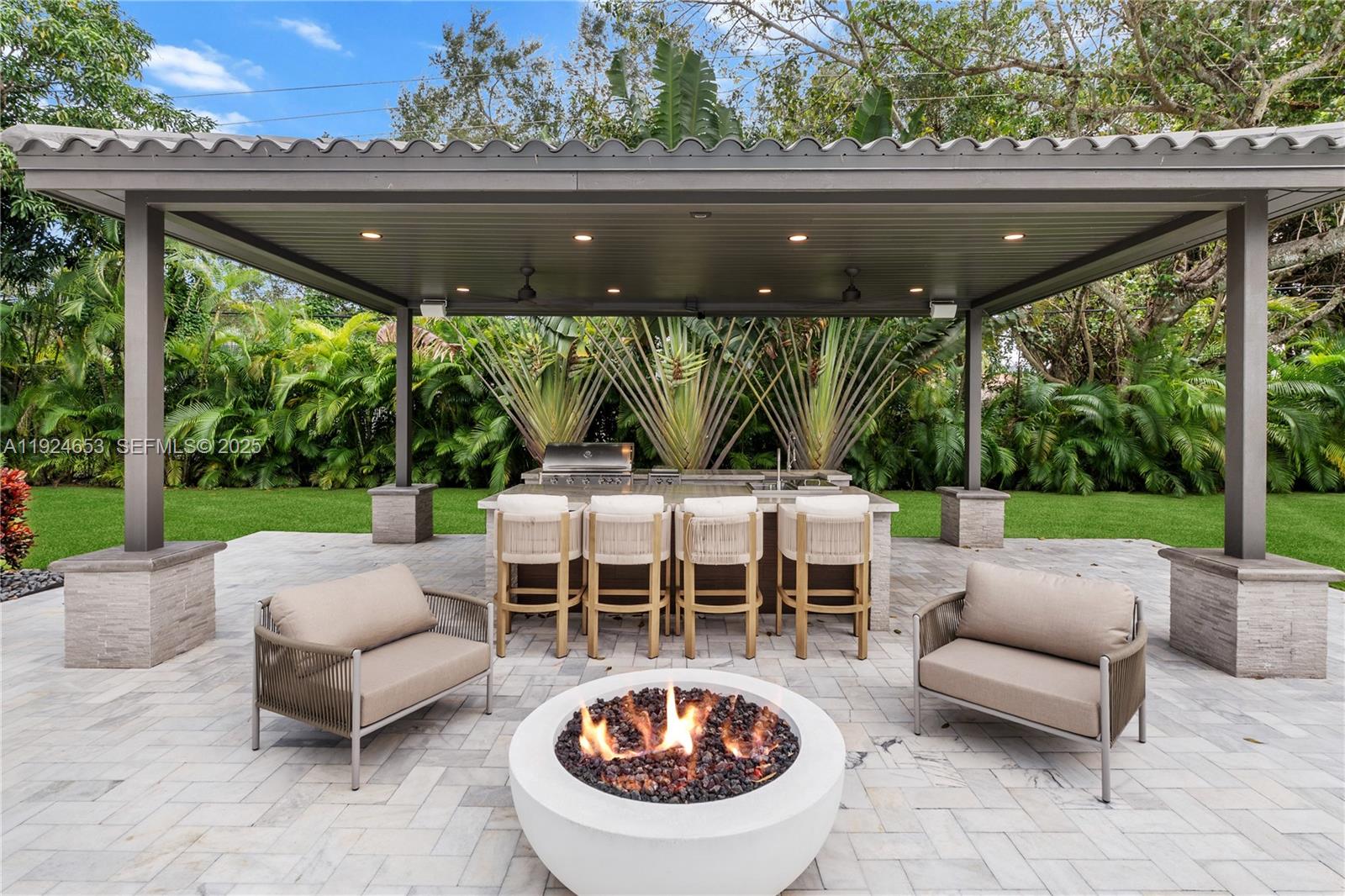 6080 Southwest 104th Street Pinecrest, FL 33156 - Photo 46 of 75 a view of outdoor space yard and patio